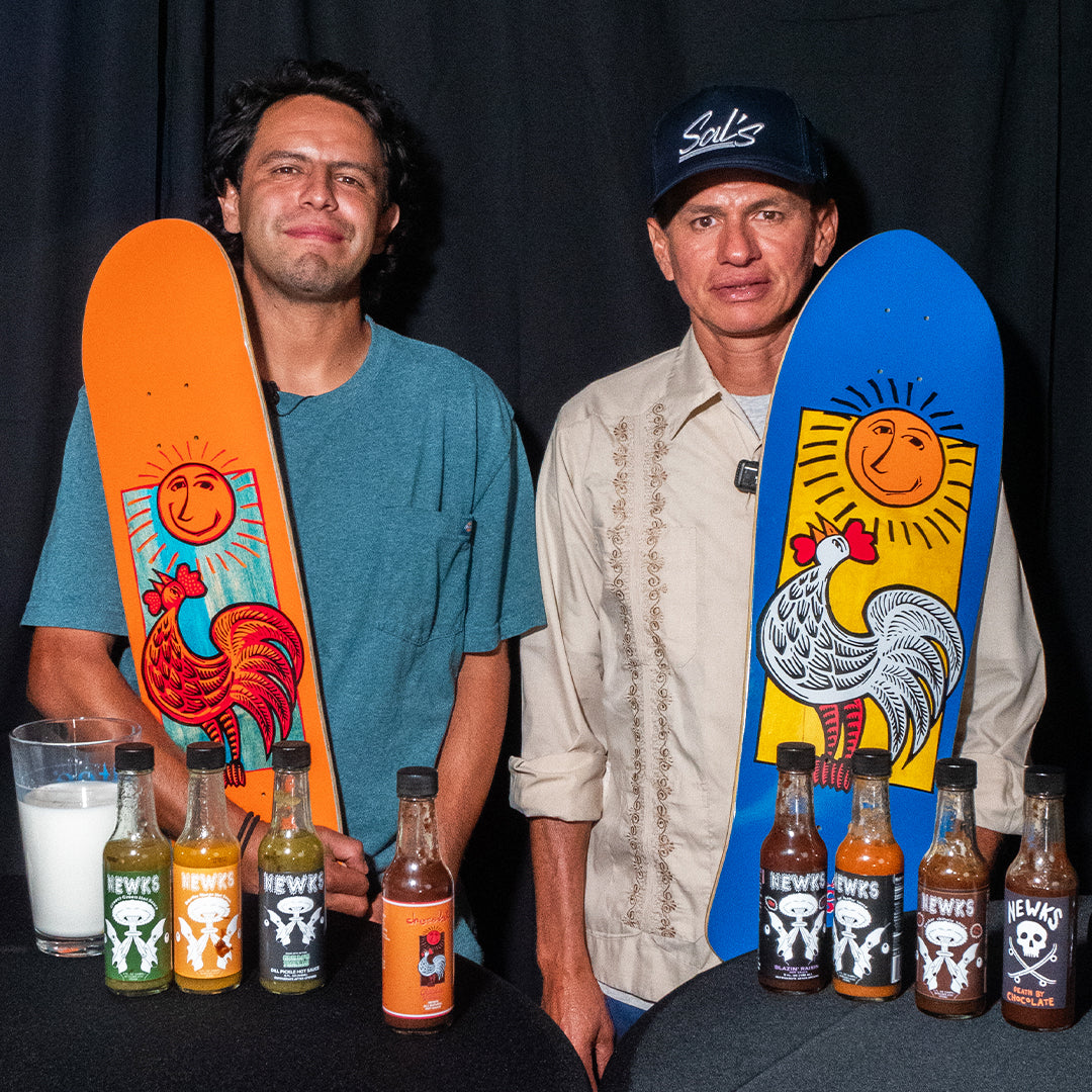 Chico and Vince holding boards