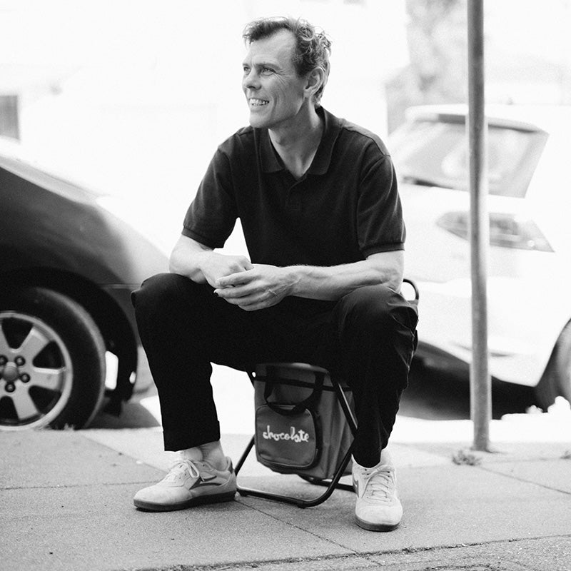 Rick Howard sitting on a very small chair