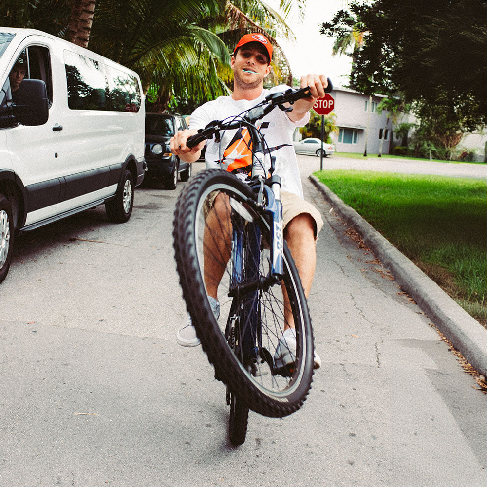 Raven Tershy riding a bike