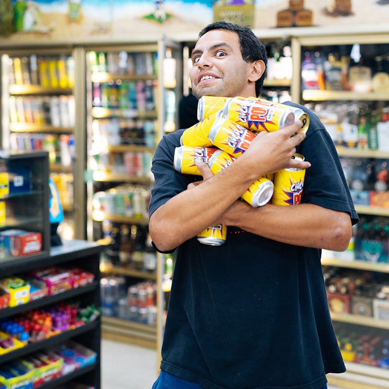 Vince holding a bunch of drinks