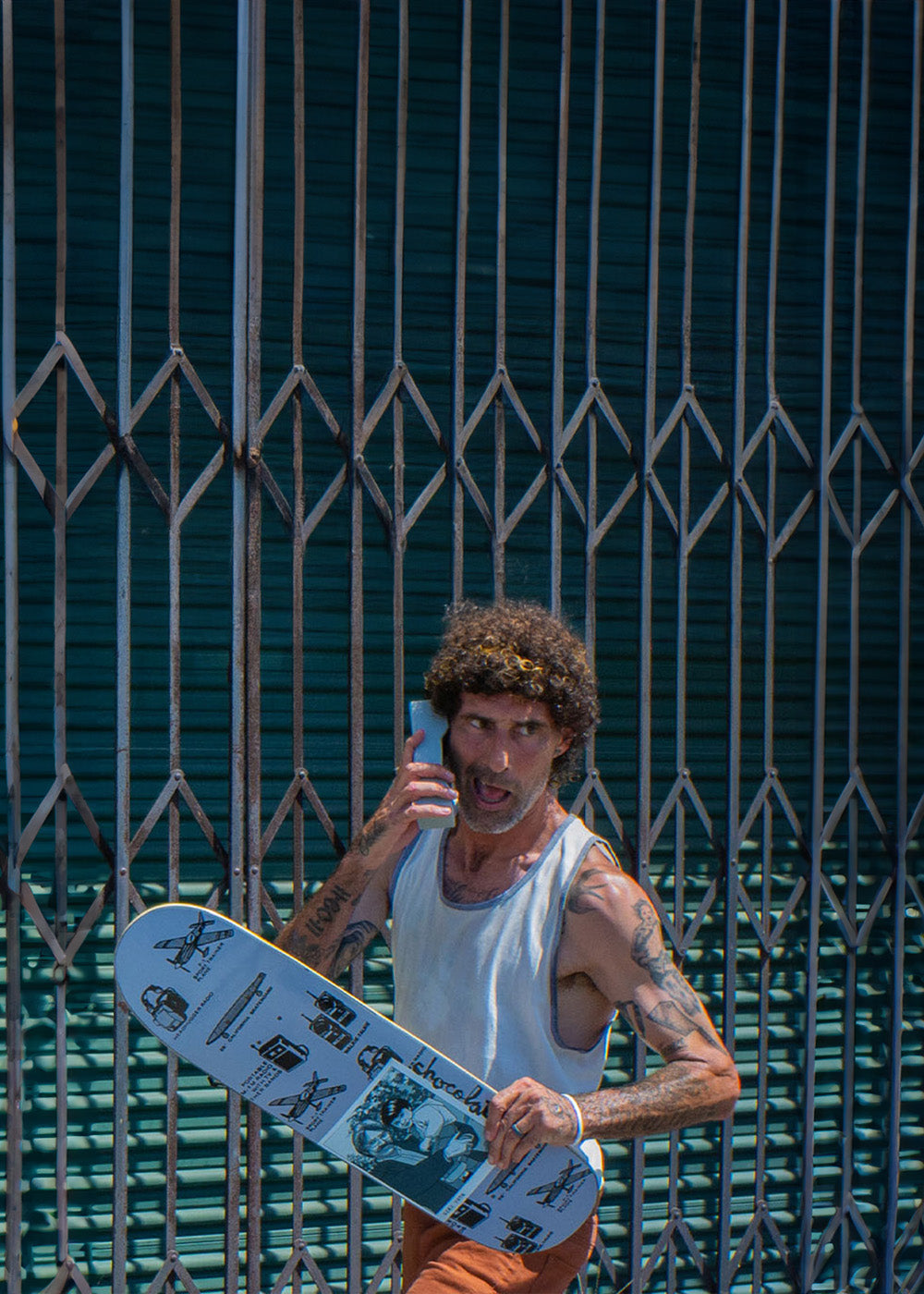 Mike York holding a skateboard